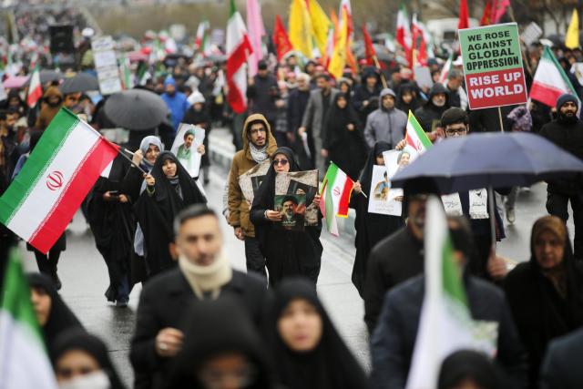 (260313) -- TEHRAN, March 13, 2026 (Xinhua) -- People attend a mass rally to mark International Quds Day in Tehran, capital of Iran, March 13, 2026. People across Iran on Friday took to the streets to mark International Quds Day, an annual event expressing support for Palestinians and condemnation of Israeli actions.
   In the capital, people marched from 10 different locations towards the iconic Enghelab Square in central Tehran, while waving Iran's flags and holding pictures of Iran's late Supreme Leader Ali Khamenei and his successor, Mojtaba Khamenei. (Xinhua)