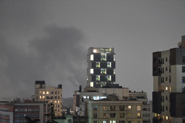 (260313) -- TEHRAN, March 13, 2026 (Xinhua) -- Smokes are seen after airstrikes in Tehran, capital of Iran, March 13, 2026. Several explosions were heard on Friday night in different areas of the Iranian capital Tehran, including the city's western and eastern parts. (Xinhua/Shadati)
