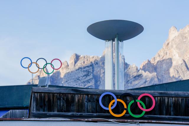 (260314) -- CORTINA D'AMPEZZO, March 14, 2026 (Xinhua) -- This photo taken on March 4, 2026 shows the cauldron of the 1956 Winter Olympic Games in front of the Cortina Curling Stadium in Cortina D'Ampezzo, Italy. Cortina d'Ampezzo, nestled in the Dolomites, a UNESCO World Heritage Site, is a winter sports destination that has hosted the Winter Olympics twice. The 1956 Winter Olympic Games left enduring venues such as the Cortina Curling Stadium, which hosted the curling events at the 2026 Winter Olympic Games and is hosting the wheelchair curling at the Paralympic Winter Games.  
Cortina's winter sports heritage dates back to 1897, with legendary slopes including the Olympia delle Tofane.
As the 2026 Paralympic Winter Games conclude on March 15, Cortina will host the closing ceremony. The flame's extinguishment here will symbolize unity, bridging 70 years of Olympic legacy. (Xinhua/Lian Zhen)