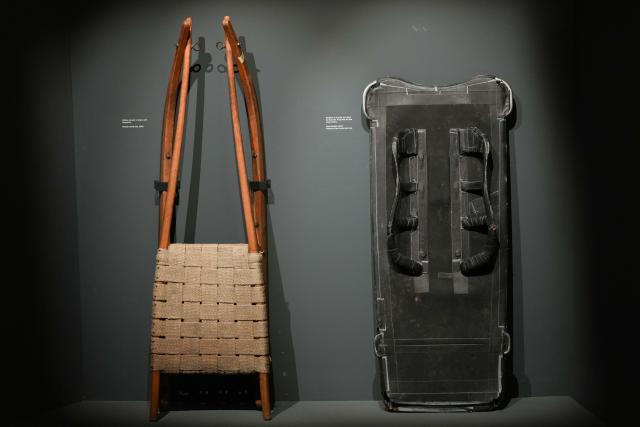 (260314) -- CORTINA D'AMPEZZO, March 14, 2026 (Xinhua) -- This photo taken on March 4, 2026 shows an old luge and a skeleton at the Cortina Story of Sport Exhibition in Cortina D'ampezzo, Italy. Cortina d'Ampezzo, nestled in the Dolomites, a UNESCO World Heritage Site, is a winter sports destination that has hosted the Winter Olympics twice. The 1956 Winter Olympic Games left enduring venues such as the Cortina Curling Stadium, which hosted the curling events at the 2026 Winter Olympic Games and is hosting the wheelchair curling at the Paralympic Winter Games.  
Cortina's winter sports heritage dates back to 1897, with legendary slopes including the Olympia delle Tofane.
As the 2026 Paralympic Winter Games conclude on March 15, Cortina will host the closing ceremony. The flame's extinguishment here will symbolize unity, bridging 70 years of Olympic legacy. (Xinhua/Lian Zhen)