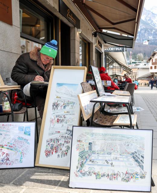(260314) -- CORTINA D'AMPEZZO, March 14, 2026 (Xinhua) -- French artist Marc Arl paints for Milan-Cortina 2026 Paralympic Winter Games in Cortina d'Ampezzo, Italy, on March 9, 2026. Cortina d'Ampezzo, nestled in the Dolomites, a UNESCO World Heritage Site, is a winter sports destination that has hosted the Winter Olympics twice. The 1956 Winter Olympic Games left enduring venues such as the Cortina Curling Stadium, which hosted the curling events at the 2026 Winter Olympic Games and is hosting the wheelchair curling at the Paralympic Winter Games.  
Cortina's winter sports heritage dates back to 1897, with legendary slopes including the Olympia delle Tofane.
As the 2026 Paralympic Winter Games conclude on March 15, Cortina will host the closing ceremony. The flame's extinguishment here will symbolize unity, bridging 70 years of Olympic legacy. (Xinhua/Wang Kaiyan)