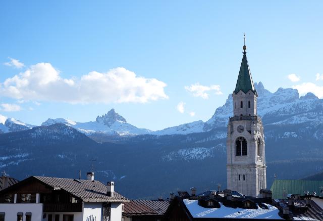 (260314) -- CORTINA D'AMPEZZO, March 14, 2026 (Xinhua) -- This photo taken on March 4, 2026 shows a view in Cortina D'ampezzo, Italy. Cortina d'Ampezzo, nestled in the Dolomites, a UNESCO World Heritage Site, is a winter sports destination that has hosted the Winter Olympics twice. The 1956 Winter Olympic Games left enduring venues such as the Cortina Curling Stadium, which hosted the curling events at the 2026 Winter Olympic Games and is hosting the wheelchair curling at the Paralympic Winter Games.  
Cortina's winter sports heritage dates back to 1897, with legendary slopes including the Olympia delle Tofane.
As the 2026 Paralympic Winter Games conclude on March 15, Cortina will host the closing ceremony. The flame's extinguishment here will symbolize unity, bridging 70 years of Olympic legacy. (Xinhua/Hou Zhaokang)