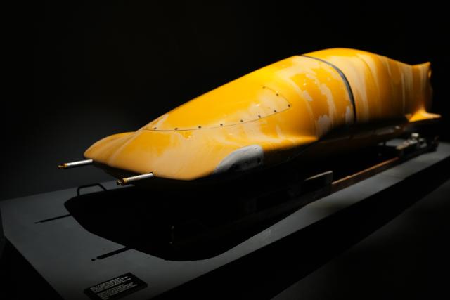 (260314) -- CORTINA D'AMPEZZO, March 14, 2026 (Xinhua) -- This photo taken on March 4, 2026 shows an old bobsleigh displayed at the Cortina Story of Sport Exhibition in Cortina D'ampezzo, Italy. Cortina d'Ampezzo, nestled in the Dolomites, a UNESCO World Heritage Site, is a winter sports destination that has hosted the Winter Olympics twice. The 1956 Winter Olympic Games left enduring venues such as the Cortina Curling Stadium, which hosted the curling events at the 2026 Winter Olympic Games and is hosting the wheelchair curling at the Paralympic Winter Games.  
Cortina's winter sports heritage dates back to 1897, with legendary slopes including the Olympia delle Tofane.
As the 2026 Paralympic Winter Games conclude on March 15, Cortina will host the closing ceremony. The flame's extinguishment here will symbolize unity, bridging 70 years of Olympic legacy. (Xinhua/Hou Zhaokang)