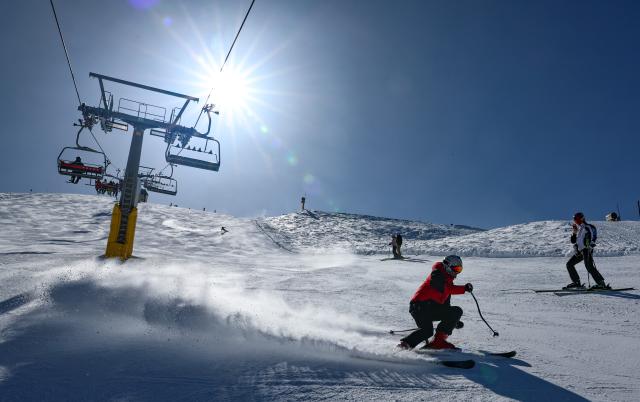 (260314) -- CORTINA D'AMPEZZO, March 14, 2026 (Xinhua) -- Skiers ski at the ski resort Faloria, which hosted the giant slalom competition at the 1956 Winter Olympic Games, in Cortina d'Ampezzo, Italy, on March 5, 2026. Cortina d'Ampezzo, nestled in the Dolomites, a UNESCO World Heritage Site, is a winter sports destination that has hosted the Winter Olympics twice. The 1956 Winter Olympic Games left enduring venues such as the Cortina Curling Stadium, which hosted the curling events at the 2026 Winter Olympic Games and is hosting the wheelchair curling at the Paralympic Winter Games.  
Cortina's winter sports heritage dates back to 1897, with legendary slopes including the Olympia delle Tofane.
As the 2026 Paralympic Winter Games conclude on March 15, Cortina will host the closing ceremony. The flame's extinguishment here will symbolize unity, bridging 70 years of Olympic legacy. (Xinhua/Wang Kaiyan)