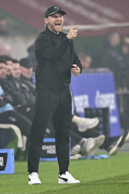 (260314) -- MOENCHENGLADBACH, March 14, 2026 (Xinhua) -- Eugen Polanski, head coach of Borussia Moenchengladbach, reacts during the German first division of Bundesliga football match between Borussia Moenchengladbach and FC St. Pauli in Moenchengladbach, Germany, March 13, 2026. (Photo by Ulrich Hufnagel/Xinhua)
