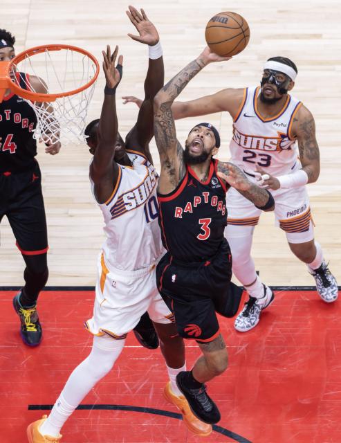(260314) -- TORONTO, March 14, 2026 (Xinhua) -- Brandon Ingram (2nd R) of Toronto Raptors goes for a layup during the 2025-2026 NBA regular season game between Toronto Raptors and Phoenix Suns in Toronto, Canada, on March 13, 2026. (Photo by Zou Zheng/Xinhua)