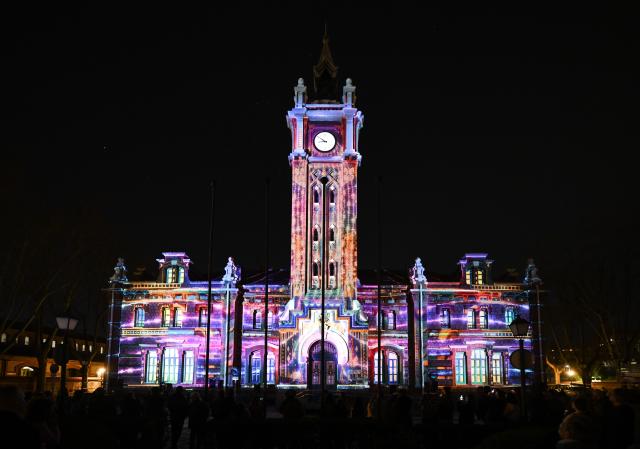 (260314) -- MADRID, March 14, 2026 (Xinhua) -- This photo taken on March 13, 2026 shows a light projection show staged on the facade of a bell tower at LuzMadrid 2026, an international light festival, in Madrid, Spain.
  LuzMadrid 2026 is held here from March 12 to March 14. (Xinhua/Cheng Min)
