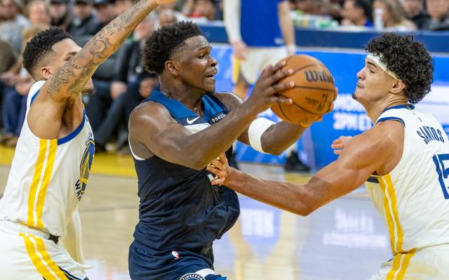 (260314) -- SAN FRANCISCO, March 14, 2026 (Xinhua) -- Minnesota Timberwolves' Anthony Edwards (C) dribbles during the 2025-2026 NBA regular season basketball game between Minnesota Timberwolves and Golden State Warriors in San Francisco, the United States, March 13, 2026. (Photo by Dong Xudong/Xinhua)