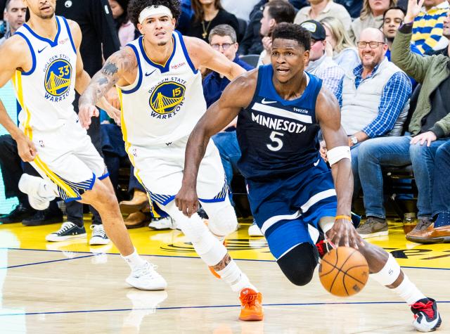 (260314) -- SAN FRANCISCO, March 14, 2026 (Xinhua) -- Minnesota Timberwolves' Anthony Edwards (R) dribbles during the 2025-2026 NBA regular season basketball game between Minnesota Timberwolves and Golden State Warriors in San Francisco, the United States, March 13, 2026. (Photo by Dong Xudong/Xinhua)