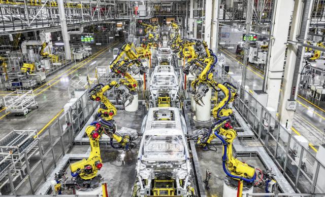(260314) -- BEIJING, March 14, 2026 (Xinhua) -- A drone photo shows an automated production line at the Seres Super Factory in Liangjiang New Area, southwest China's Chongqing, Sept. 19, 2025. (Xinhua/Wang Quanchao)