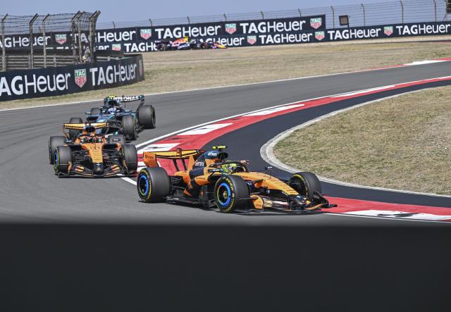 (260314) -- SHANGHAI, March 14, 2026 (Xinhua) -- McLaren's Lando Norris (front) of Britain competes during the Sprint race of Formula One Chinese Grand Prix at Shanghai International Circuit in Shanghai, China, March 14, 2026. (Xinhua/Chen Haoming)