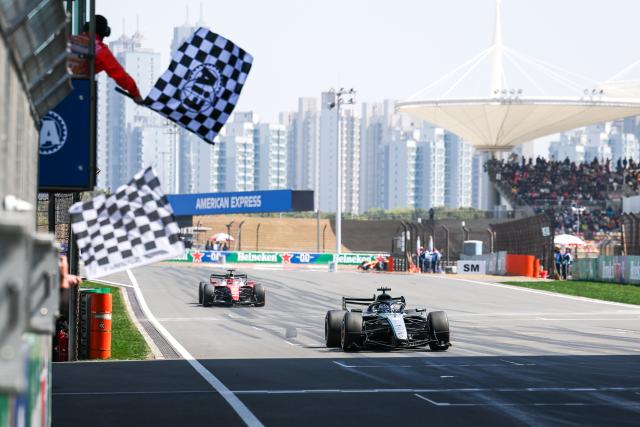 (260314) -- SHANGHAI, March 14, 2026 (Xinhua) -- Mercedes' George Russell of Britain crosses the finish line during the Sprint race of Formula One Chinese Grand Prix at Shanghai International Circuit in Shanghai, China, March 14, 2026. (Photo by Qian Jun/Xinhua)