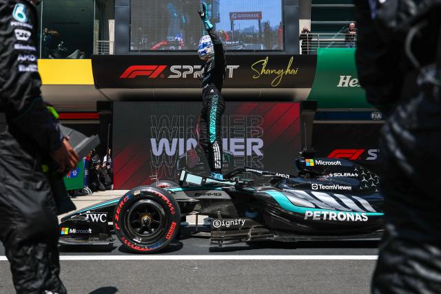 (260314) -- SHANGHAI, March 14, 2026 (Xinhua) -- Mercedes' George Russell of Britain celebrates after winning the Sprint race of Formula One Chinese Grand Prix at Shanghai International Circuit in Shanghai, China, March 14, 2026. (Photo by Qian Jun/Xinhua)