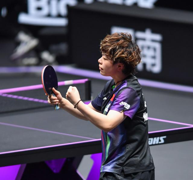 (260314) -- CHONGQING, March 14, 2026 (Xinhua) -- Wang Yidi of China reacts after wining the women's singles quarterfinal between Wang Yidi of China and Shin Yubin of South Korea at the WTT Champions Chongqing 2026 in southwest China's Chongqing, March 14, 2026. (Xinhua/Tang Yi)