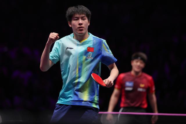 (260314) -- CHONGQING, March 14, 2026 (Xinhua) -- Wen Ruibo of China reacts during the men's singles quarterfinal match between Wen Ruibo of China and Qiu Dang of Germany at the WTT Champions Chongqing 2026 in southwest China's Chongqing, March 14, 2026. (Xinhua/Huang Wei)