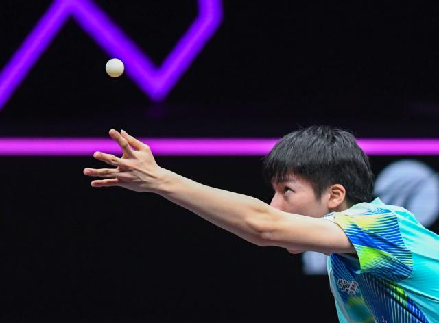 (260314) -- CHONGQING, March 14, 2026 (Xinhua) -- Wen Ruibo of China serves during the men's singles quarterfinal match between Wen Ruibo of China and Qiu Dang of Germany at the WTT Champions Chongqing 2026 in southwest China's Chongqing, March 14, 2026. (Xinhua/Tang Yi)