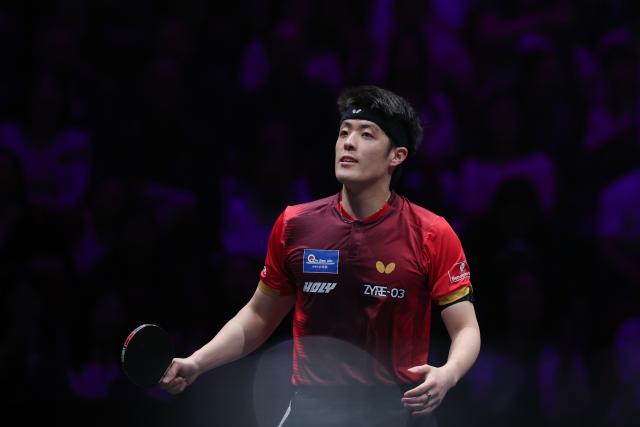 (260314) -- CHONGQING, March 14, 2026 (Xinhua) -- Qiu Dang of Germany reacts during the men's singles quarterfinal match between Wen Ruibo of China and Qiu Dang of Germany at the WTT Champions Chongqing 2026 in southwest China's Chongqing, March 14, 2026. (Xinhua/Huang Wei)