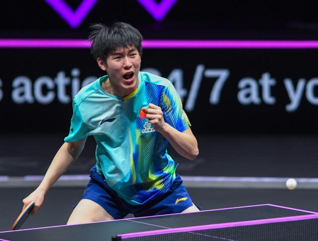 (260314) -- CHONGQING, March 14, 2026 (Xinhua) -- Wen Ruibo of China reacts during the men's singles quarterfinal match between Wen Ruibo of China and Qiu Dang of Germany at the WTT Champions Chongqing 2026 in southwest China's Chongqing, March 14, 2026. (Xinhua/Tang Yi)