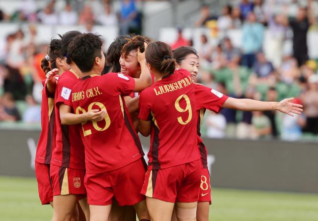 (260314) -- PERTH, March 14, 2026 (Xinhua) -- Players of China celebrate scoring during the quarterfinal of Women's Asian Cup between China and Chinese Taipei at Perth Rectangular Stadium in Perth, Australia, March 14, 2026. (Photo by Zhou Dan/Xinhua)