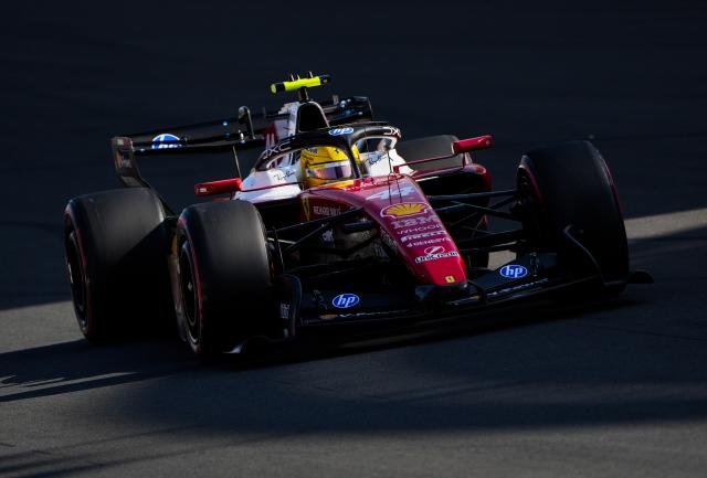 (260314) -- SHANGHAI, March 14, 2026 (Xinhua) -- Ferrari's Lewis Hamilton of Britain competes during the Qualifying of Formula One Chinese Grand Prix at Shanghai International Circuit in Shanghai, China, March 14, 2026. (Xinhua/Ding Ting)