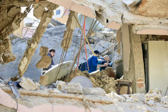 (260314) -- SIDON, March 14, 2026 (Xinhua) -- People inspect the site damaged by an Israeli airstrike near Sidon, Lebanon, March 13, 2026. The death toll from Israeli attacks on Lebanon since March 2 has reached 773, with 1,933 injuries, the country's Public Health Ministry said Friday. (Photo by Ali Hashisho/Xinhua)