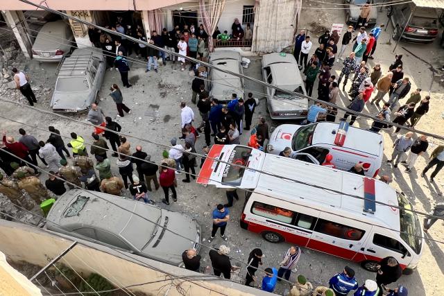 (260314) -- SIDON, March 14, 2026 (Xinhua) -- People inspect the site damaged by an Israeli airstrike near Sidon, Lebanon, March 13, 2026. The death toll from Israeli attacks on Lebanon since March 2 has reached 773, with 1,933 injuries, the country's Public Health Ministry said Friday. (Photo by Ali Hashisho/Xinhua)