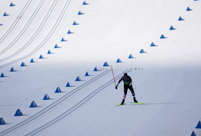 (260314) -- TESERO, March 14, 2026 (Xinhua) -- Sydney Peterson of the United States competes during the para cross-country skiing mixed 4x2.5km relay at the Milan-Cortina 2026 Paralympic Winter Games in Tesero, Italy, March 14, 2026. (Xinhua/Lian Zhen)