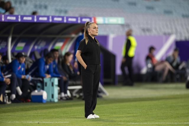 (260314) -- SYDNEY, March 14, 2026 (Xinhua) -- Kotryna Kulbyte, head coach of Uzbekistan, reacts during the quarterfinal of Women's Asian Cup between South Korea and Uzbekistan in Sydney, Australia, March 14, 2026. (Xinhua/Hu Jingchen)