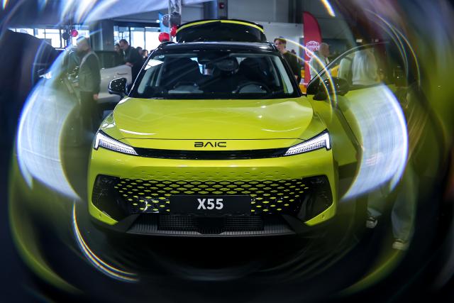 (260314) -- BUDAPEST, March 14, 2026 (Xinhua) -- This photo taken on March 13, 2026 shows a car at a booth of Chinese car maker BAIC during the International Automobile and Tuning Show in Budapest, Hungary. The International Automobile and Tuning Show kicked off on Friday, with the participation of several Chinese car brands. (Photo by David Balog/Xinhua)