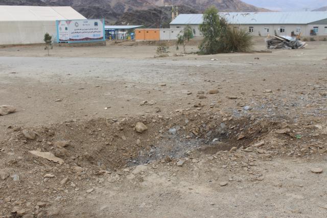(260314) -- TORKHAM, March 14, 2026 (Xinhua) -- A crater and traces left by a mortar shell are seen at the Omari camp, Torkham, Afghanistan, March 11, 2026. TO GO WITH "Feature: Afghan returnees crave peace as border conflict disrupts resettlement" (Photo by Hamidullah/Xinhua)