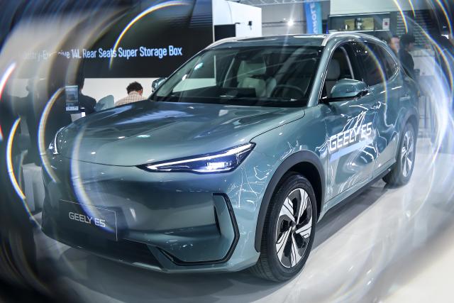 (260314) -- BUDAPEST, March 14, 2026 (Xinhua) -- This photo taken on March 13, 2026 shows a car at a booth of Chinese car brand Geely during the International Automobile and Tuning Show in Budapest, Hungary. The International Automobile and Tuning Show kicked off on Friday, with the participation of several Chinese car brands. (Photo by David Balog/Xinhua)