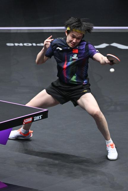 (260314) -- CHONGQING, March 14, 2026 (Xinhua) -- Wang Chuqin hits a return during the men's singles quarterfinal between Wang Chuqin of China and Matsushima Sora of Japan at the WTT Champions Chongqing 2026 in southwest China's Chongqing, March 14, 2026. (Xinhua/Chen Cheng)