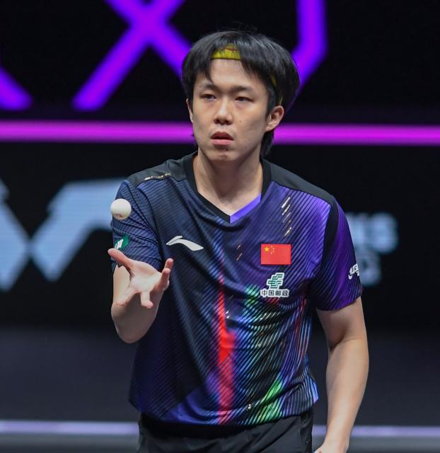 (260314) -- CHONGQING, March 14, 2026 (Xinhua) -- Wang Chuqin reacts during the men's singles quarterfinal between Wang Chuqin of China and Matsushima Sora of Japan at the WTT Champions Chongqing 2026 in southwest China's Chongqing, March 14, 2026. (Xinhua/Tang Yi)