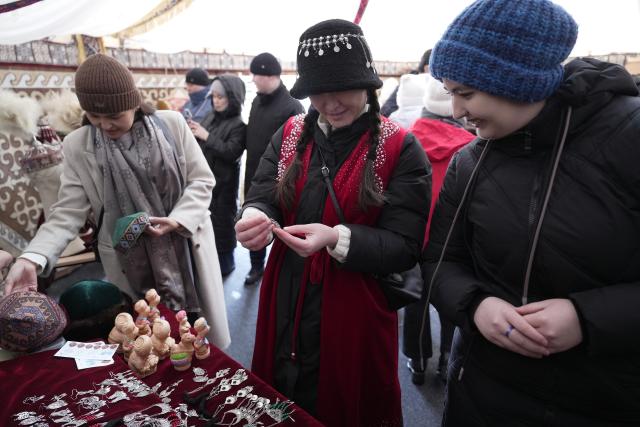 (260314) -- ASTANA, March 14, 2026 (Xinhua) -- People visit a traditional fair during a Nauryz festival celebration in Astana, Kazakhstan, March 14, 2026. Regarded as the beginning of a New Year and one of the most important festivals in Central Asian countries, Nauryz (also known as Nowruz) marks the first day of spring. (Photo by Kalizhan Ospanov/Xinhua)