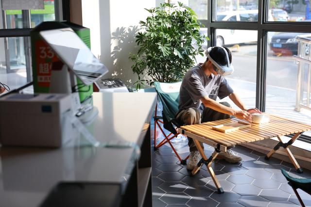 (260708) -- GUIYANG, July 8, 2026 (Xinhua) -- A data collector captures real-world inputs for embodied intelligent devices at a cafe scenario in Yunyan District of Guiyang City, southwest China's Guizhou Province, July 6, 2026. With the rapid development of embodied artificial intelligence (AI), a new profession, trainers of embodied AI, has emerged, which comprise roles such as data collectors.
   In Guizhou, China's first national comprehensive big data pilot zone, data collectors are producing the essential "raw material" for the digital economy, bridging the physical and digital worlds.
   Data collection professionals show a rising demand in recent years, becoming an emerging career path in digital job market. (Xinhua/Liu Xu)
