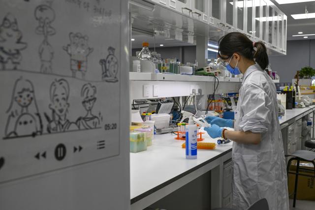 (260708) -- SHANGHAI, July 8, 2026 (Xinhua) -- A researcher conducts an experiment at a laboratory of Interdisciplinary Research Center on Biology and Chemistry under the Chinese Academy of Sciences (CAS) in Shanghai, east China, July 6, 2026. Basic research is the foundation of all scientific and technological innovation. In recent years, the CAS Shanghai Branch has worked closely with Shanghai to foster basic research. It also provides stable support for young researchers, creating an environment where long-term scientific exploration can generate breakthroughs that serve national priorities and advance cutting-edge research. (Xinhua/Chen Shuo)
