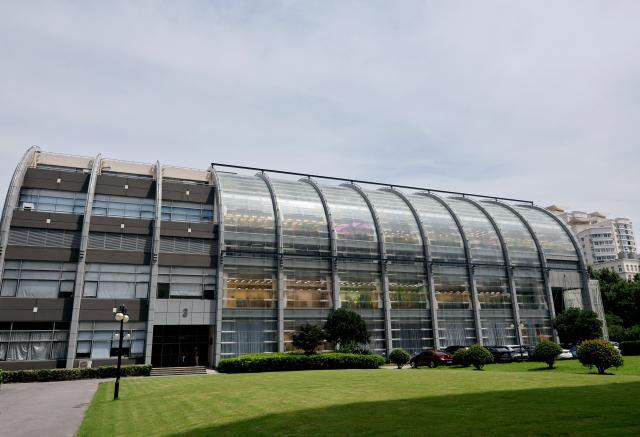 (260708) -- SHANGHAI, July 8, 2026 (Xinhua) -- This photo taken on July 7, 2026 shows a building of controlled-environment growth chamber at the Chinese Academy of Sciences (CAS) Center for Excellence in Molecular Plant Sciences in Shanghai, east China. Basic research is the foundation of all scientific and technological innovation. In recent years, the CAS Shanghai Branch has worked closely with Shanghai to foster basic research. It also provides stable support for young researchers, creating an environment where long-term scientific exploration can generate breakthroughs that serve national priorities and advance cutting-edge research. (Xinhua/Fang Zhe)