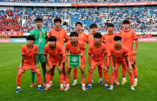 (260708) -- YINCHUAN, July 8, 2026 (Xinhua) -- Players of Chinese U17 national team line up before the CFA Team China International Youth Football Tournament Yinchuan 2026 between Chinese U17 national team and Tanzania U17 national team in Yinchuan, northwest China's Ningxia Hui Autonomous Region, July 8, 2026. (Xinhua/Yang Zhisen)