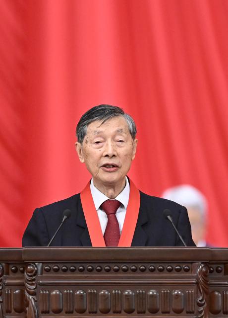 (260708) -- BEIJING, July 8, 2026 (Xinhua) -- Winner of China's top sci-tech award for the year 2025 Chen Liquan, a researcher at the Institute of Physics under the Chinese Academy of Sciences (CAS) and a Chinese Academy of Engineering (CAE) academician, speaks at a meeting bringing together the national science and technology award conference, the general assemblies of the members of the CAS and the CAE, and the 11th national congress of the China Association for Science and Technology at the Great Hall of the People in Beijing, capital of China, July 8, 2026. (Xinhua/Yue Yuewei)