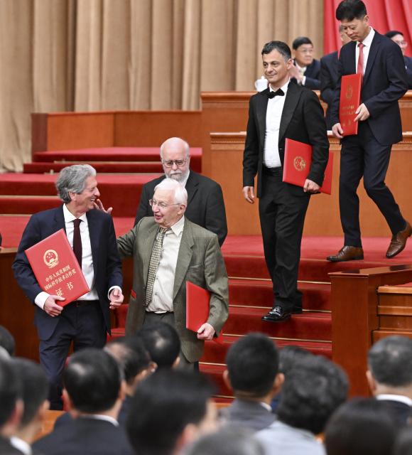 (260708) -- BEIJING, July 8, 2026 (Xinhua) -- A meeting bringing together the national science and technology award conference, the general assemblies of the members of the Chinese Academy of Sciences (CAS) and the Chinese Academy of Engineering (CAE), and the 11th national congress of the China Association for Science and Technology is held at the Great Hall of the People in Beijing, capital of China, July 8, 2026. (Xinhua/Shen Hong)