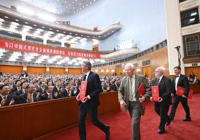 (260708) -- BEIJING, July 8, 2026 (Xinhua) -- A meeting bringing together the national science and technology award conference, the general assemblies of the members of the Chinese Academy of Sciences (CAS) and the Chinese Academy of Engineering (CAE), and the 11th national congress of the China Association for Science and Technology is held at the Great Hall of the People in Beijing, capital of China, July 8, 2026. (Xinhua/Yan Yan)