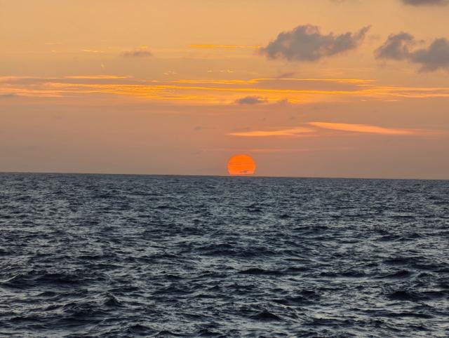 (260709) -- SANSHA, July 9, 2026 (Xinhua) -- This photo taken on July 8, 2026 shows a view of the sunset over the waters surrounding the Xisha Islands, south China's Hainan Province. (Xinhua/Xing Guangli)