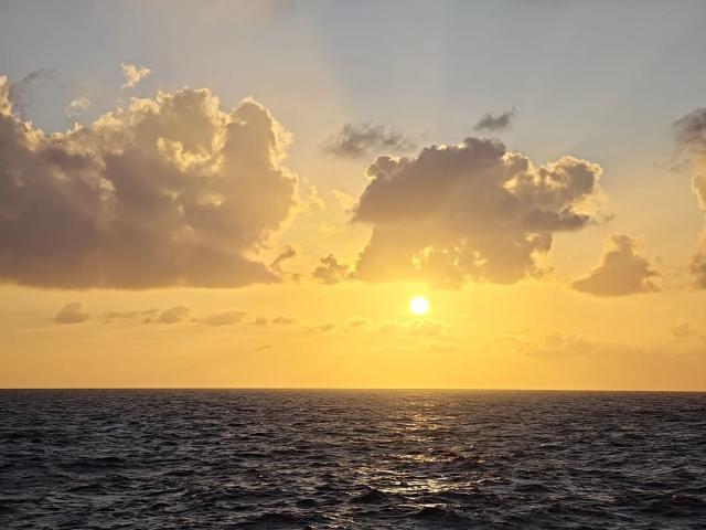 (260709) -- SANSHA, July 9, 2026 (Xinhua) -- This photo taken on July 8, 2026 shows a view of the sunset over the waters surrounding the Xisha Islands, south China's Hainan Province. (Xinhua/Xing Guangli)