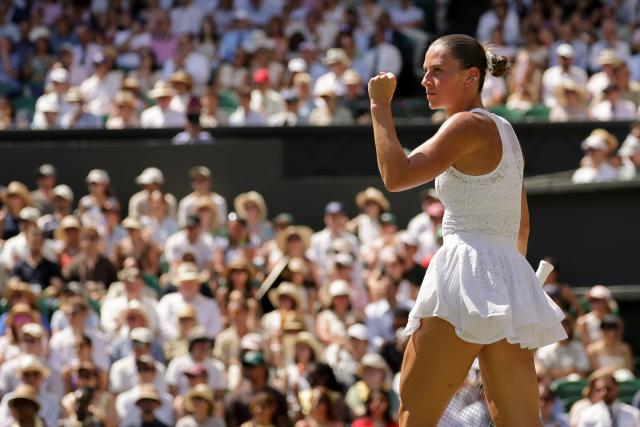 (260709) -- LONDON, July 9, 2026 (Xinhua) -- Marta Kostyuk of Ukraine celebrates a point during the women's singles quarterfinal match against Jasmine Paolini of Itlay at the Wimbledon Tennis Championships in London, Britain, on July 8, 2026. (Photo by Dinendra Haria/Xinhua)
