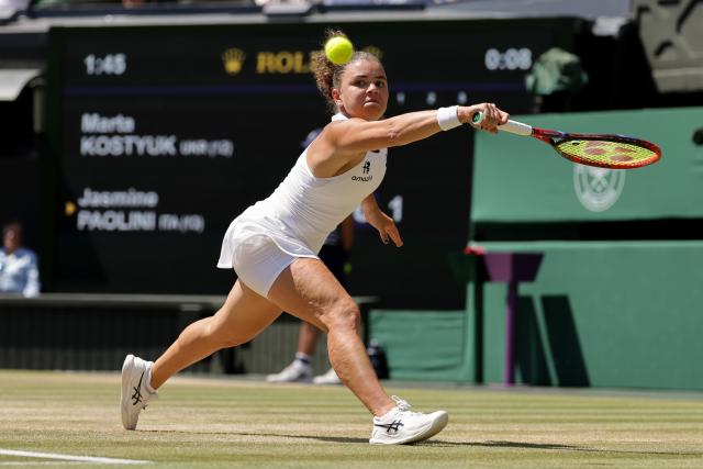 (260709) -- LONDON, July 9, 2026 (Xinhua) -- Jasmine Paolini of Itlay returns the ball during the women's singles quarterfinal match against Marta Kostyuk of Ukraine at the Wimbledon Tennis Championships in London, Britain, on July 8, 2026. (Photo by Dinendra Haria/Xinhua)