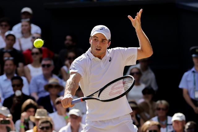 (260709) -- LONDON, July 9, 2026 (Xinhua) -- Arthur Fery of Britain returns the ball during the men's singles quarterfinal match against Flavio Cobolli of Itlay at the Wimbledon Tennis Championships in London, Britain, on July 8, 2026. (Photo by Dinendra Haria/Xinhua)