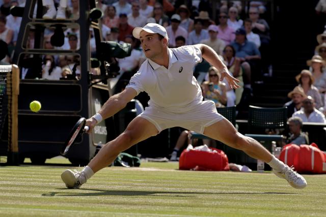 (260709) -- LONDON, July 9, 2026 (Xinhua) -- Arthur Fery of Britain returns the ball during the men's singles quarterfinal match against Flavio Cobolli of Itlay at the Wimbledon Tennis Championships in London, Britain, on July 8, 2026. (Photo by Dinendra Haria/Xinhua)