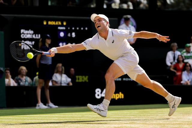 (260709) -- LONDON, July 9, 2026 (Xinhua) -- Arthur Fery of Britain returns the ball during the men's singles quarterfinal match against Flavio Cobolli of Itlay at the Wimbledon Tennis Championships in London, Britain, on July 8, 2026. (Photo by Dinendra Haria/Xinhua)