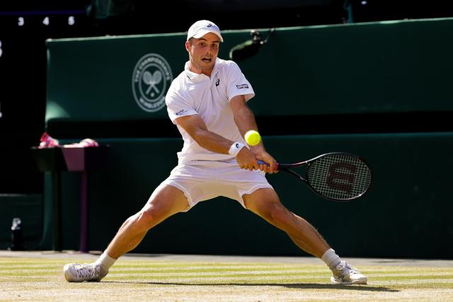 (260709) -- LONDON, July 9, 2026 (Xinhua) -- Arthur Fery of Britain returns the ball during the men's singles quarterfinal match against Flavio Cobolli of Itlay at the Wimbledon Tennis Championships in London, Britain, on July 8, 2026. (Photo by Dinendra Haria/Xinhua)