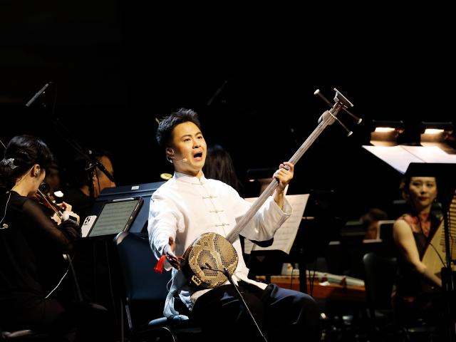 (260709) -- LOS ANGELES, July 9, 2026 (Xinhua) -- A Chinese artist performs during the "Black Myth: Wukong" concert at the Peacock Theater in downtown Los Angeles, California, the United States on July 7, 2026.
  Music from the internationally acclaimed Chinese video game "Black Myth: Wukong" filled the Peacock Theater in downtown Los Angeles on Tuesday night, drawing thousands of fans to experience the unique fusion of Chinese mythology and Eastern aesthetics.
  TO GO WITH "Roundup: Chinese hit game 'Black Myth: Wukong' concert amazes Los Angeles audiences" (Photo by Qiu Chen/Xinhua)